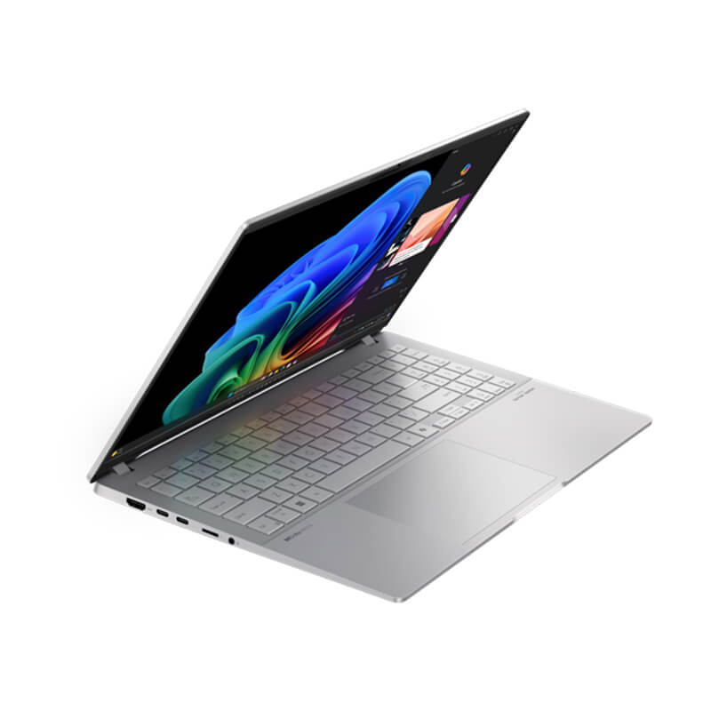 ASUS Vivobook S 15 is floating in the air, with purple metal fabric flying behind it.